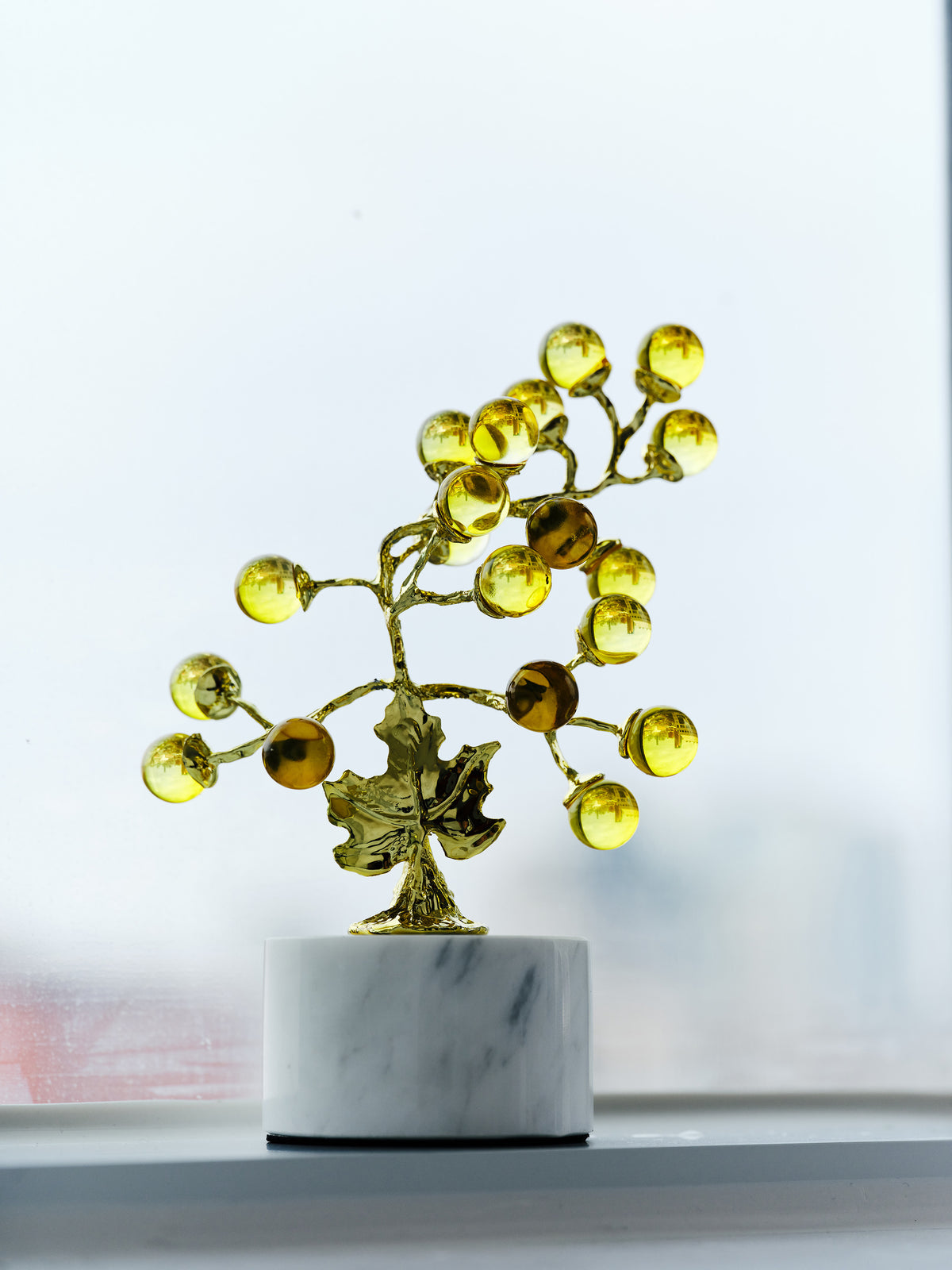 Grape Light Golden Crystal Tree with golden glass spheres on a white marble base