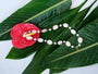 Close view of Saltlight Rhythm Necklace showing freshwater pearl shape, luster and tonal accents