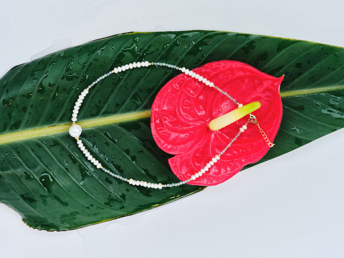 Long Light Necklace with a luminous freshwater pearl strand and sculptural pearl focal, full view